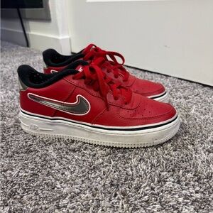 Nike red Air Force 1’s